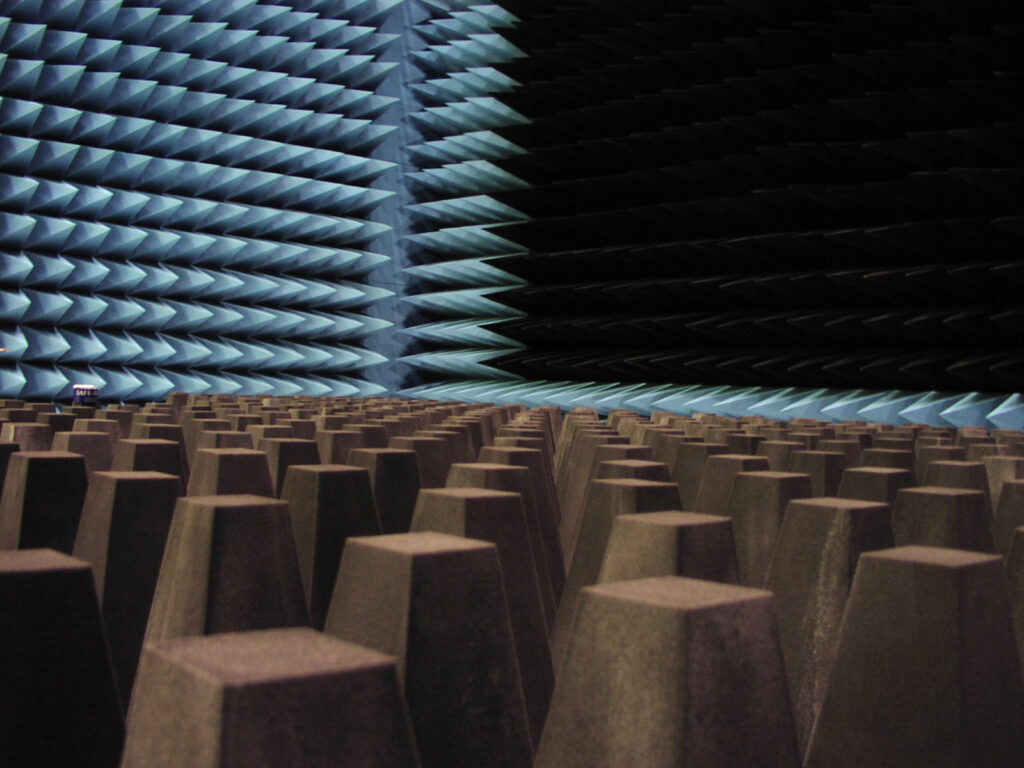 Picture taken inside large antenna measurement facility with RF foam absorber covered floor and walls